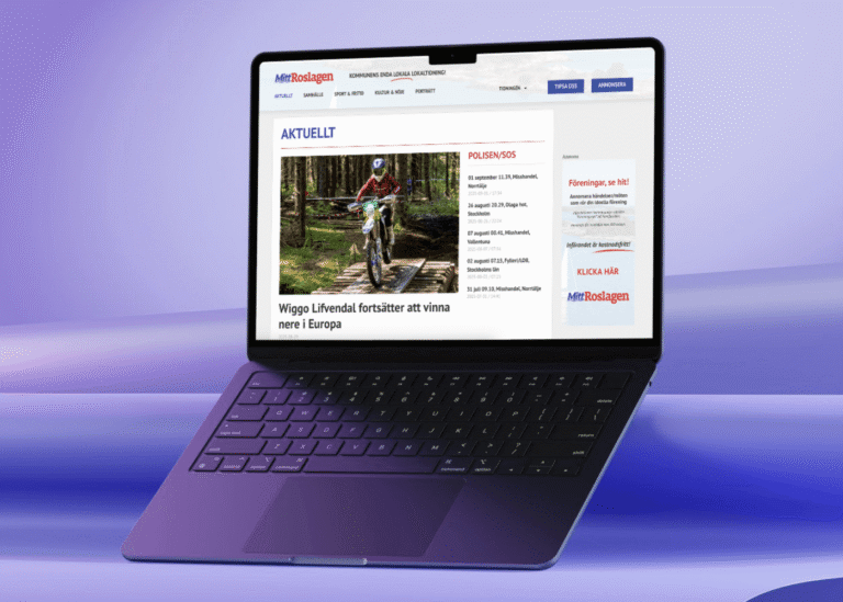 En bärbar dator visar en svensk nyhetswebbplats med en rubrik om Wiggo Löfvendals fortsatta motocrossframgångar i Europa, med en Ecobox-annons bredvid ett foto av en förare på en dirt bike i ett skogslopp.